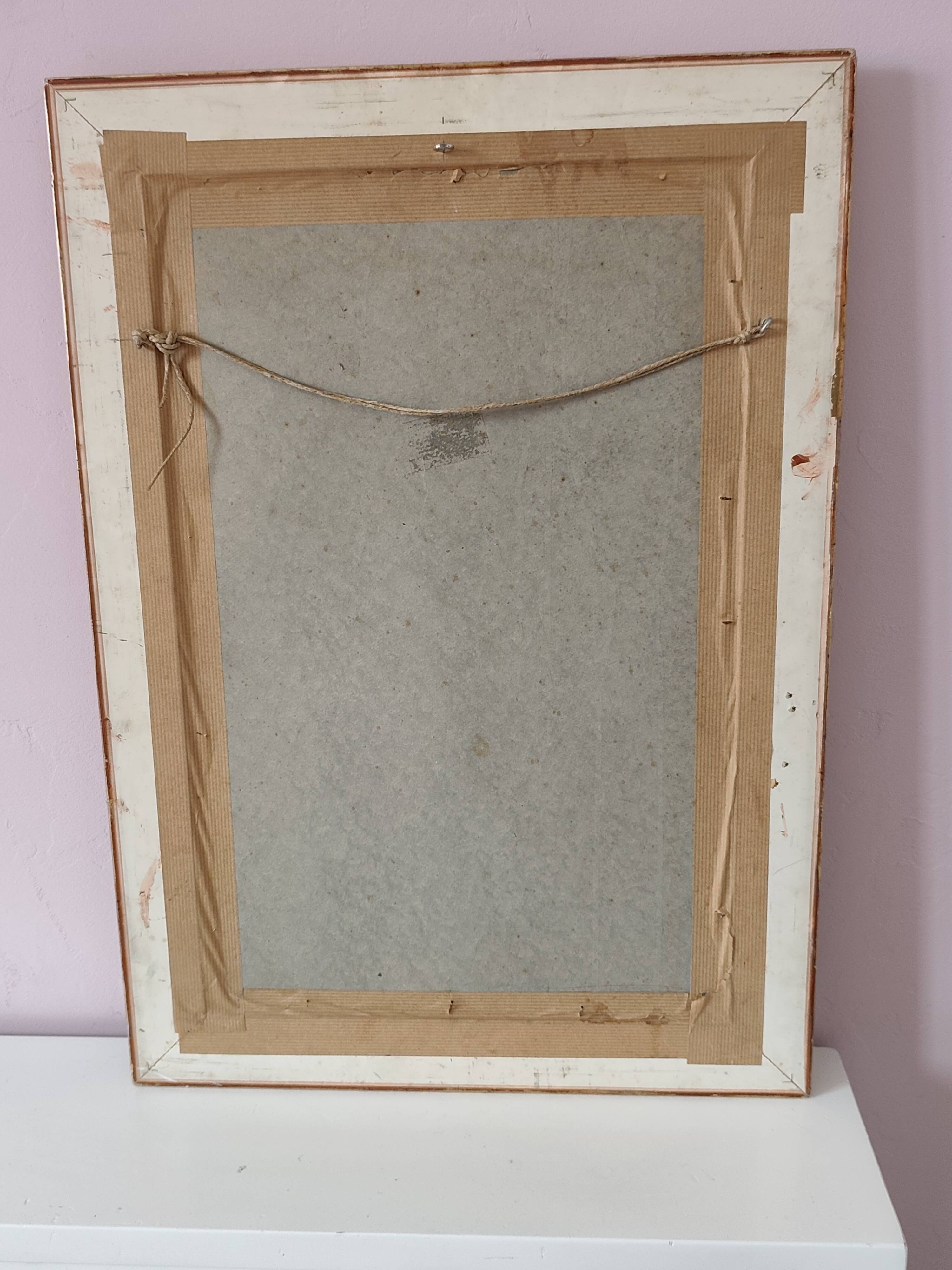 Miroir ancien en bois doré et cuivré