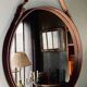 Handmade J. Adnet style mirror in brown vegetable-tanned leather, ø 70 cm