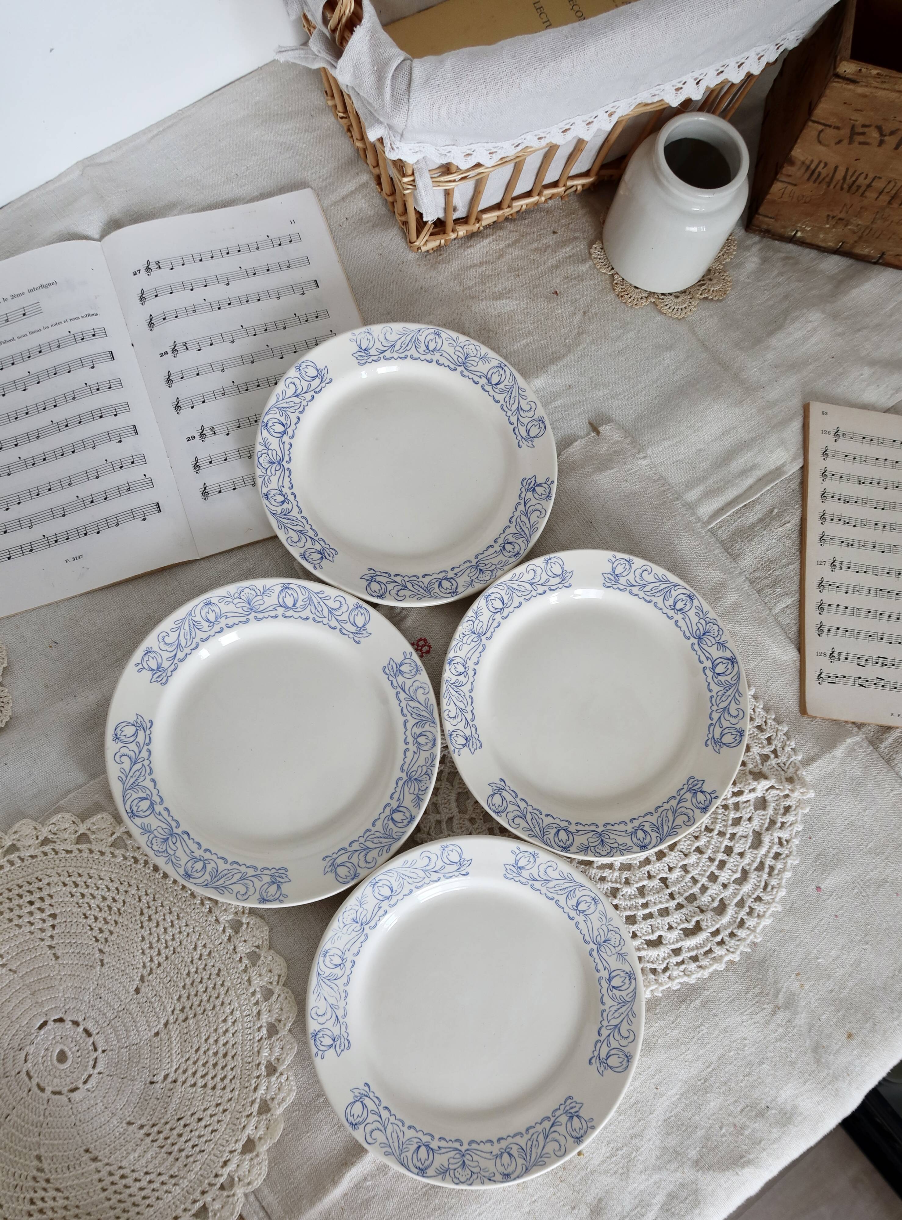 4 vintage porcelain dessert plates with blue border