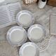 4 vintage porcelain dessert plates with blue border