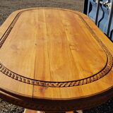 Oval dining table in solid teak