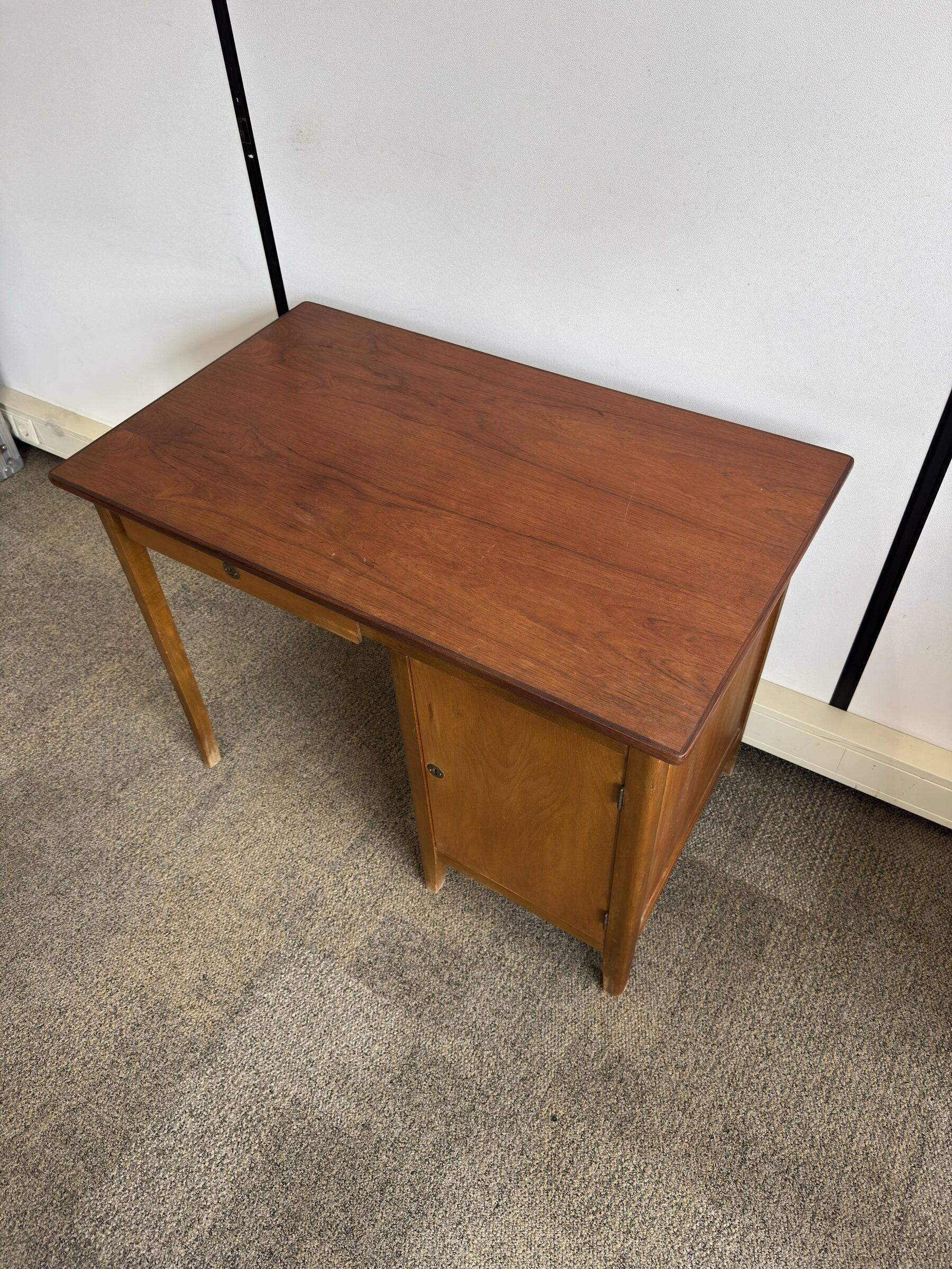 Vintage Danish desk from the 1960s with a drawer and cupboard.