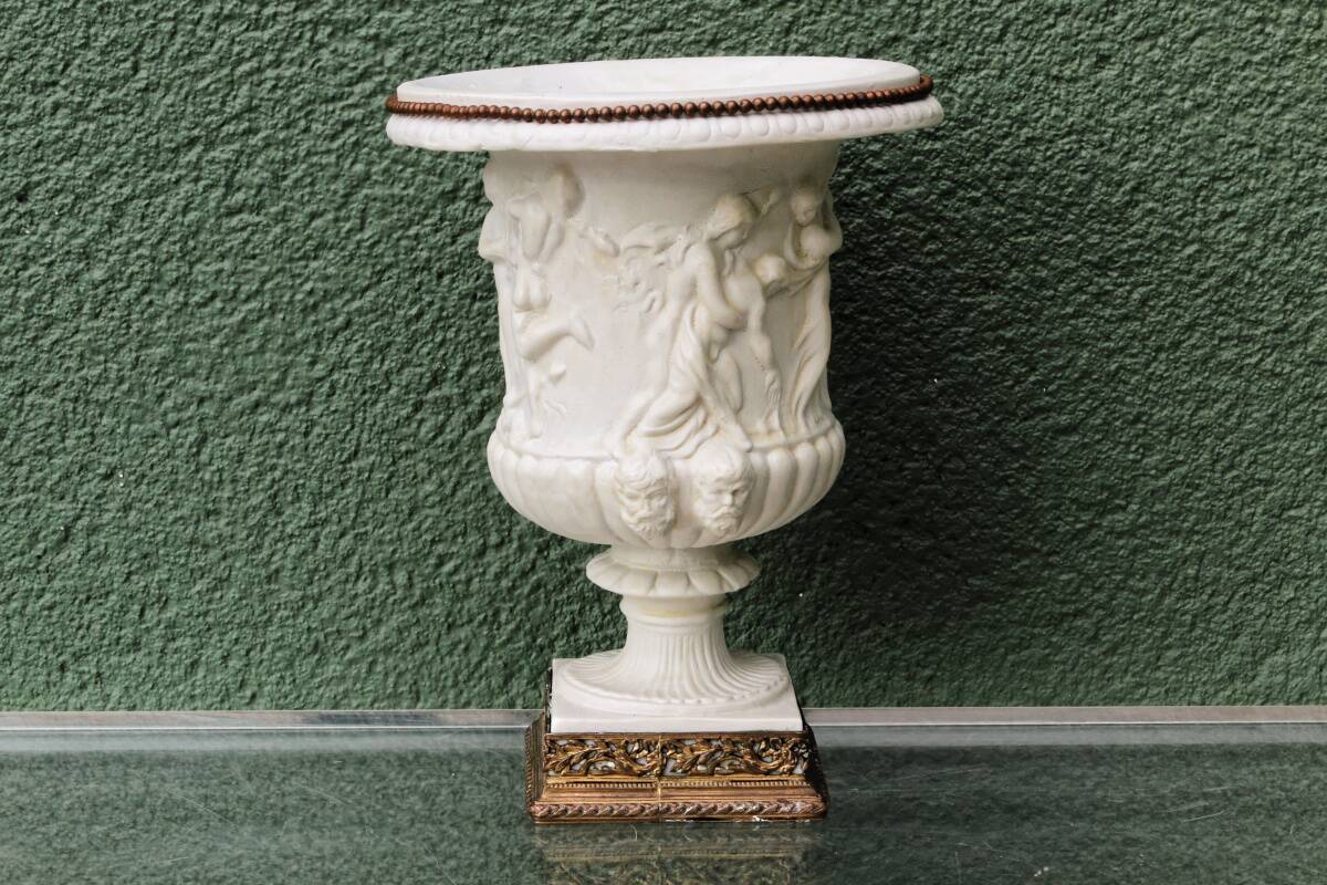 Pair of Medicis Borghese vases in porcelain biscuit and brass.