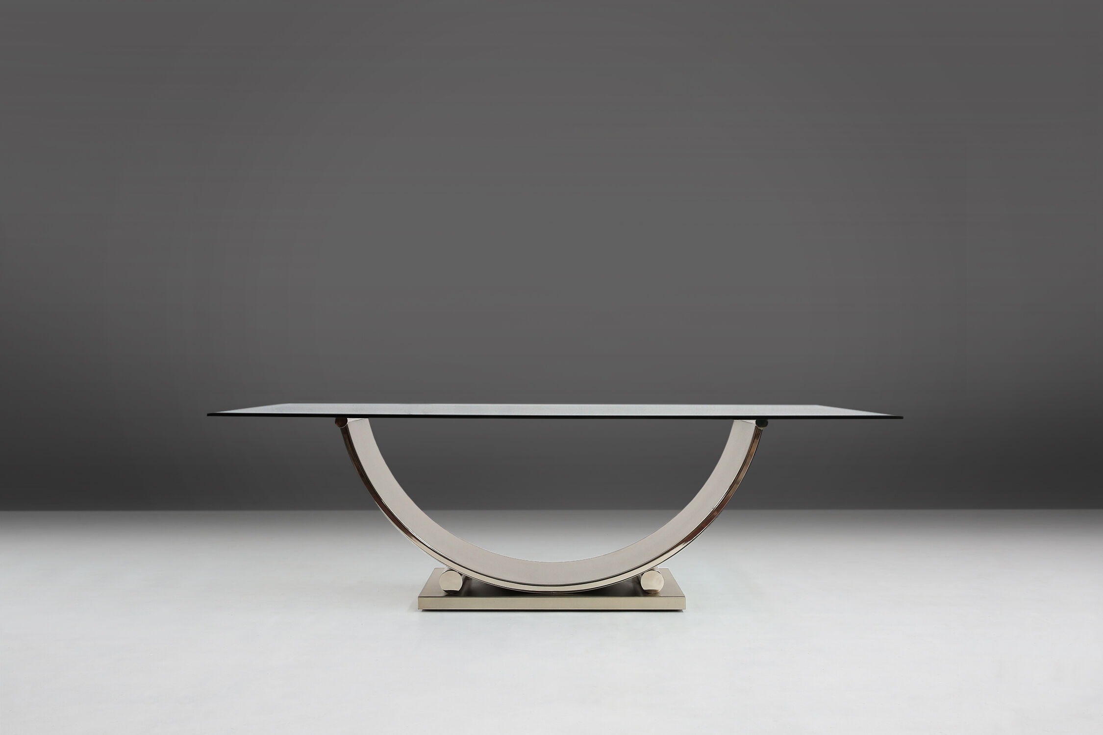 Belgo Chrom dining table in brushed stainless steel and glass top