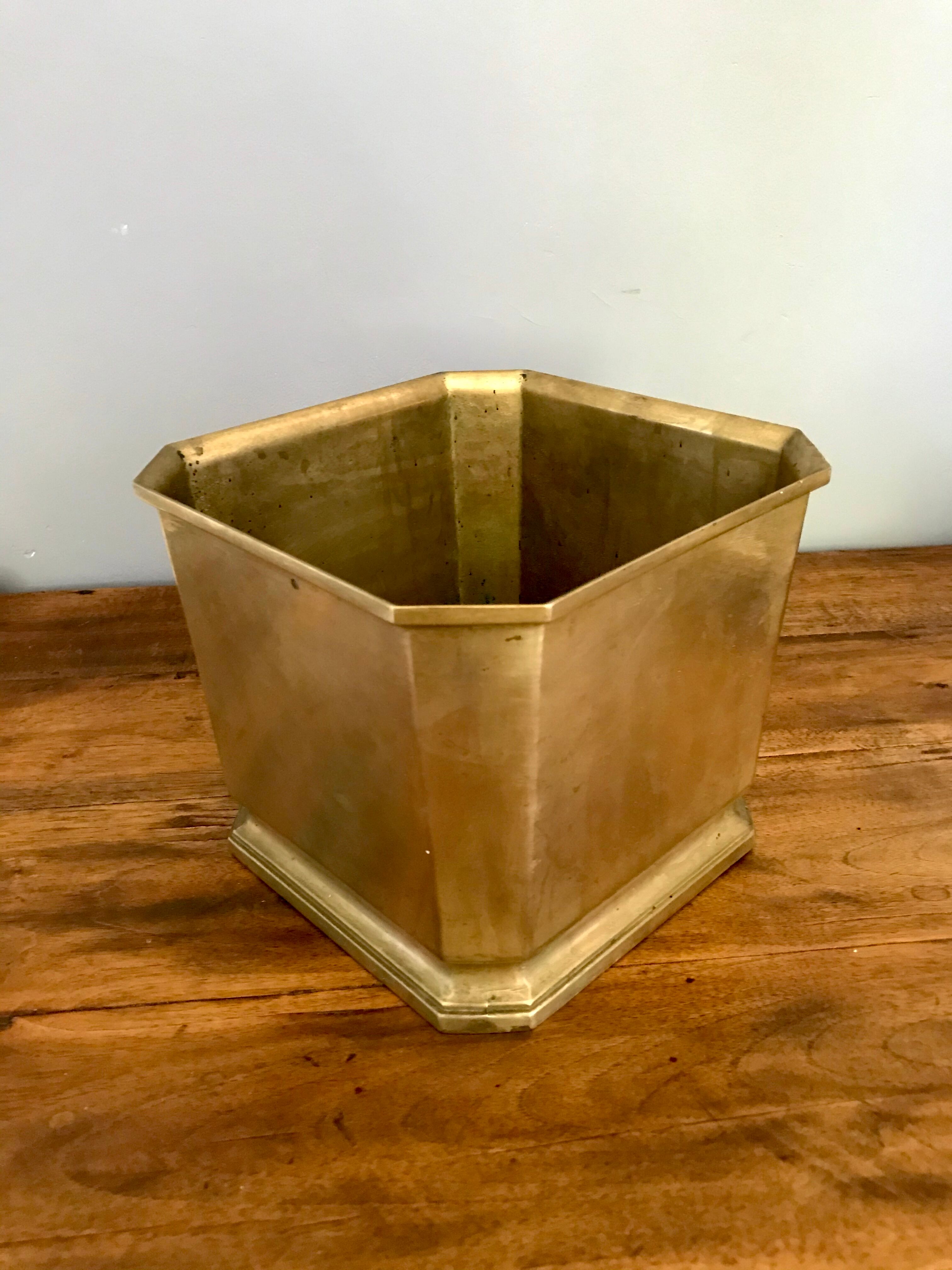 Massive brass pot cover