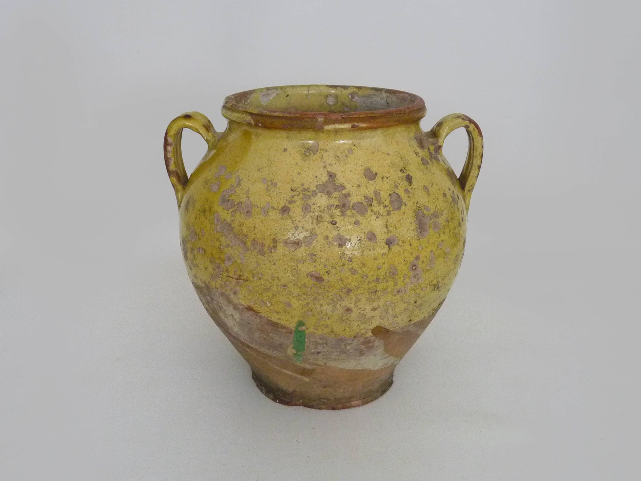 Magnificent glazed yellow confit pot, south-west of France. 19th century.
