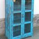 Glass cabinet in old blue wood