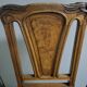 Table and 10 Art Nouveau style chairs.