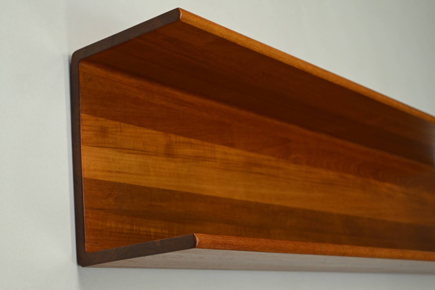 Solid teak wall shelf, 1960s Germany.