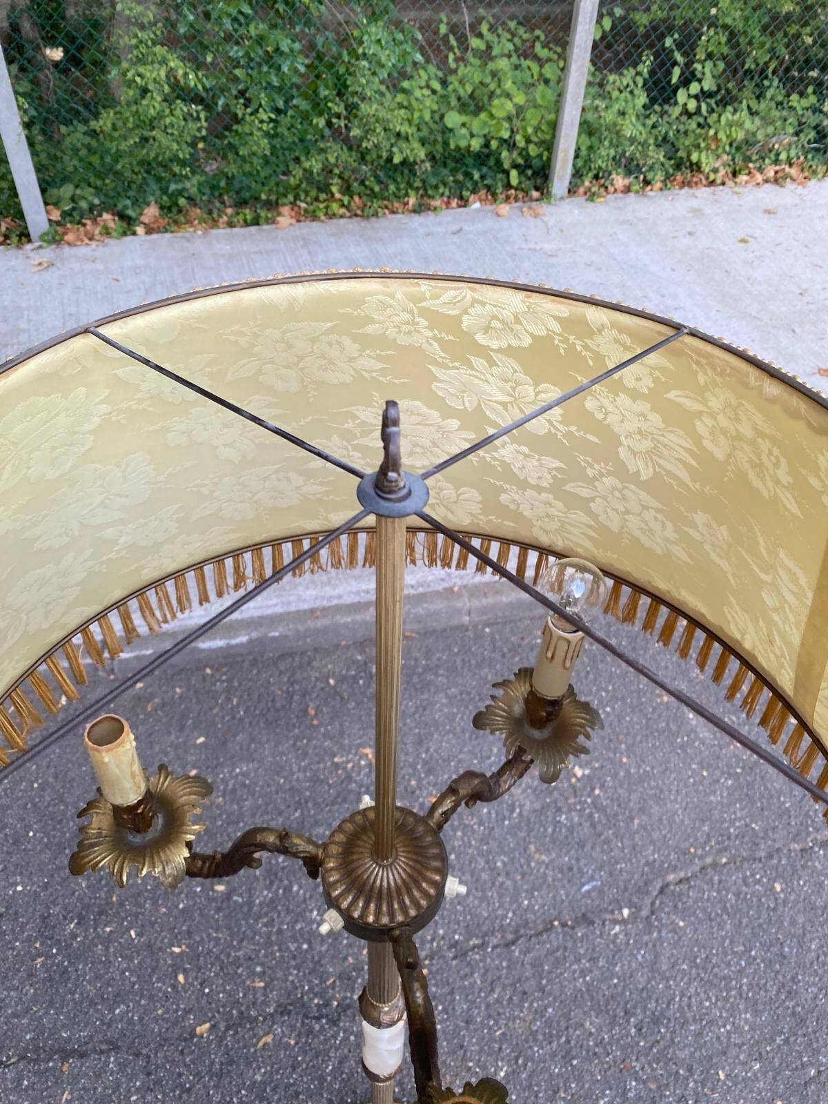 Vintage brass onyx floor lamp with fringed shade.