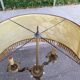 Vintage brass onyx floor lamp with fringed shade.