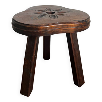 Carved wooden tripod stool