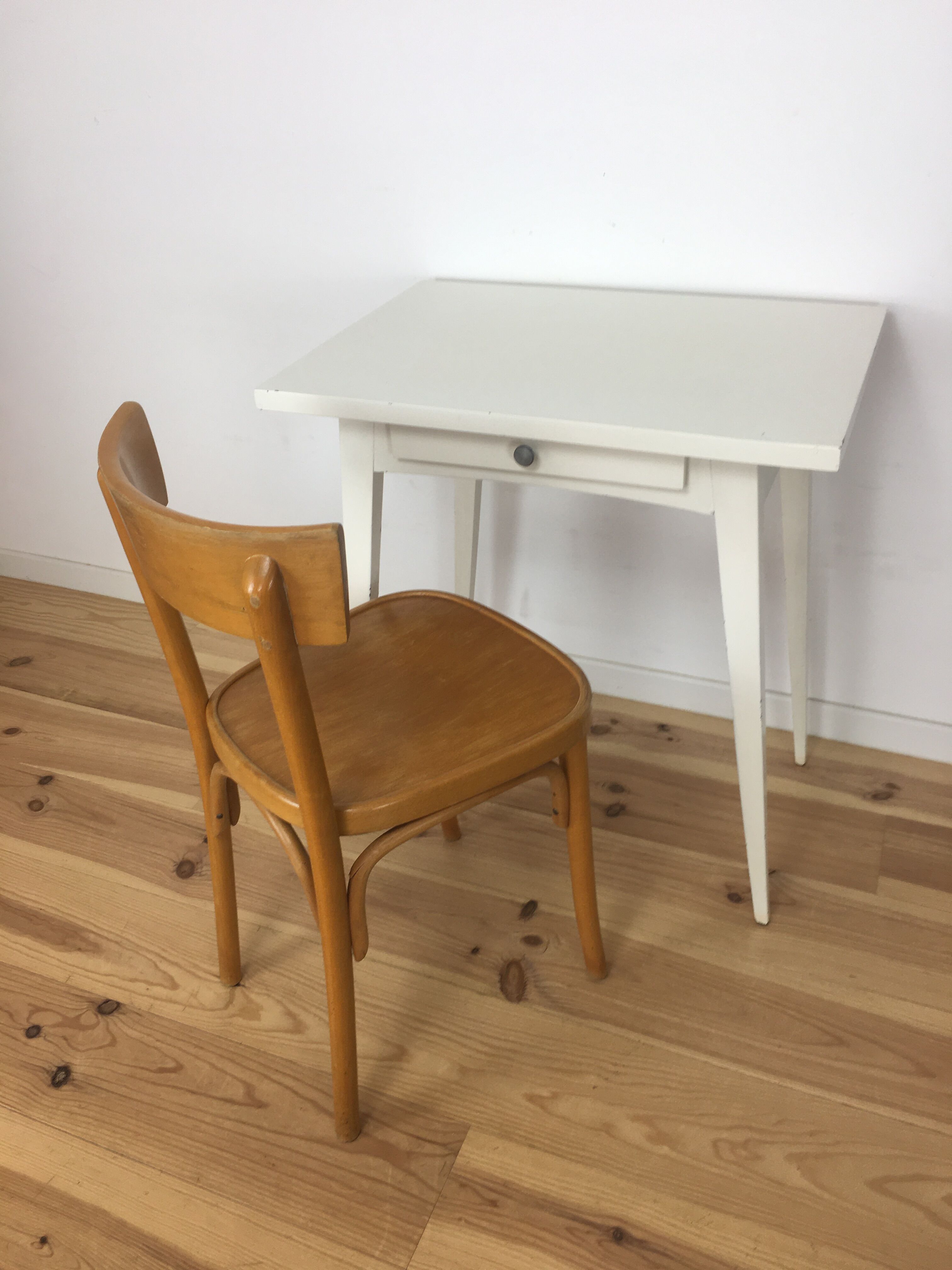 White wood desk foot compass