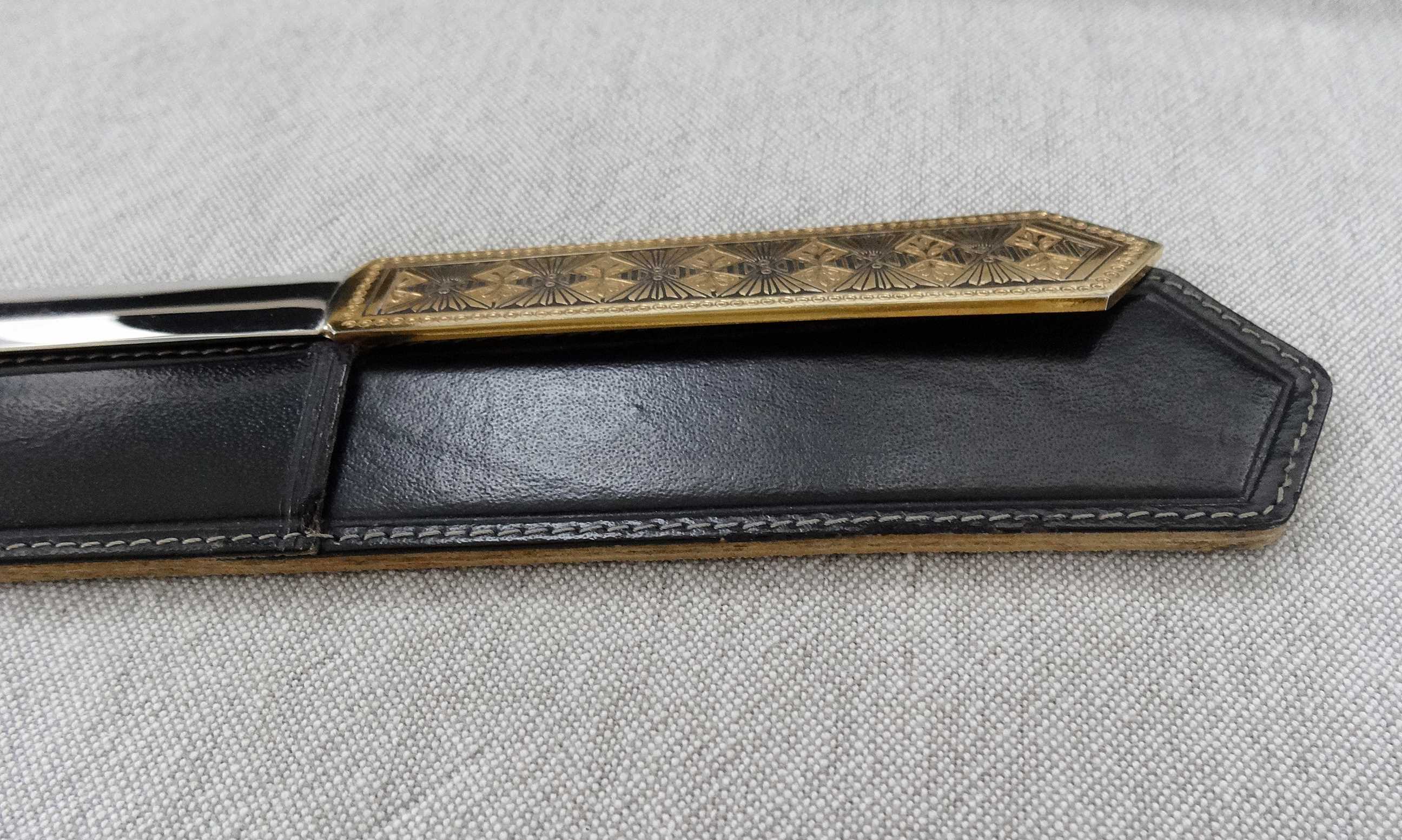 Metal paper cut in its case 1950