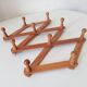 Vintage accordion wall coat rack