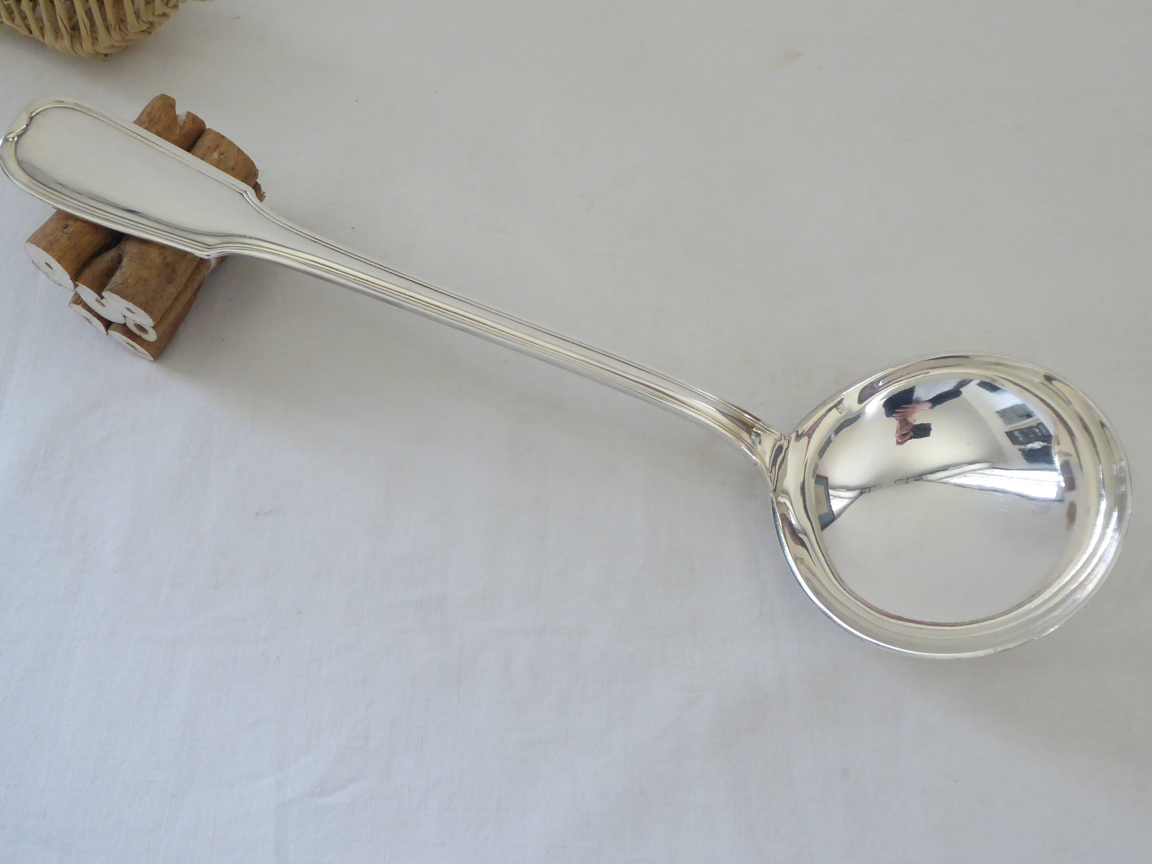 Silver metal ladle