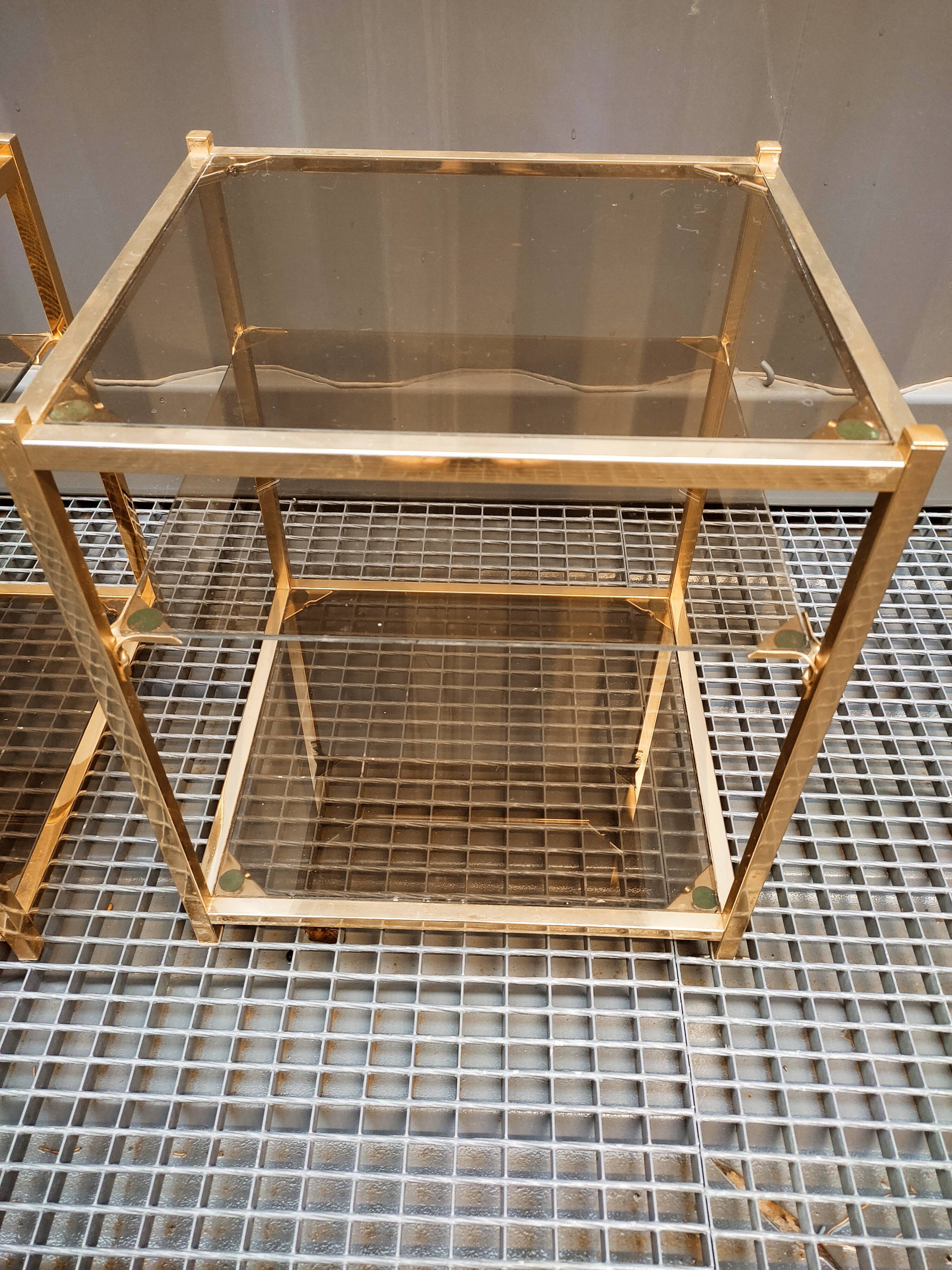 Sofa ends.in gilded metal and glass