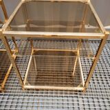 Sofa ends.in gilded metal and glass