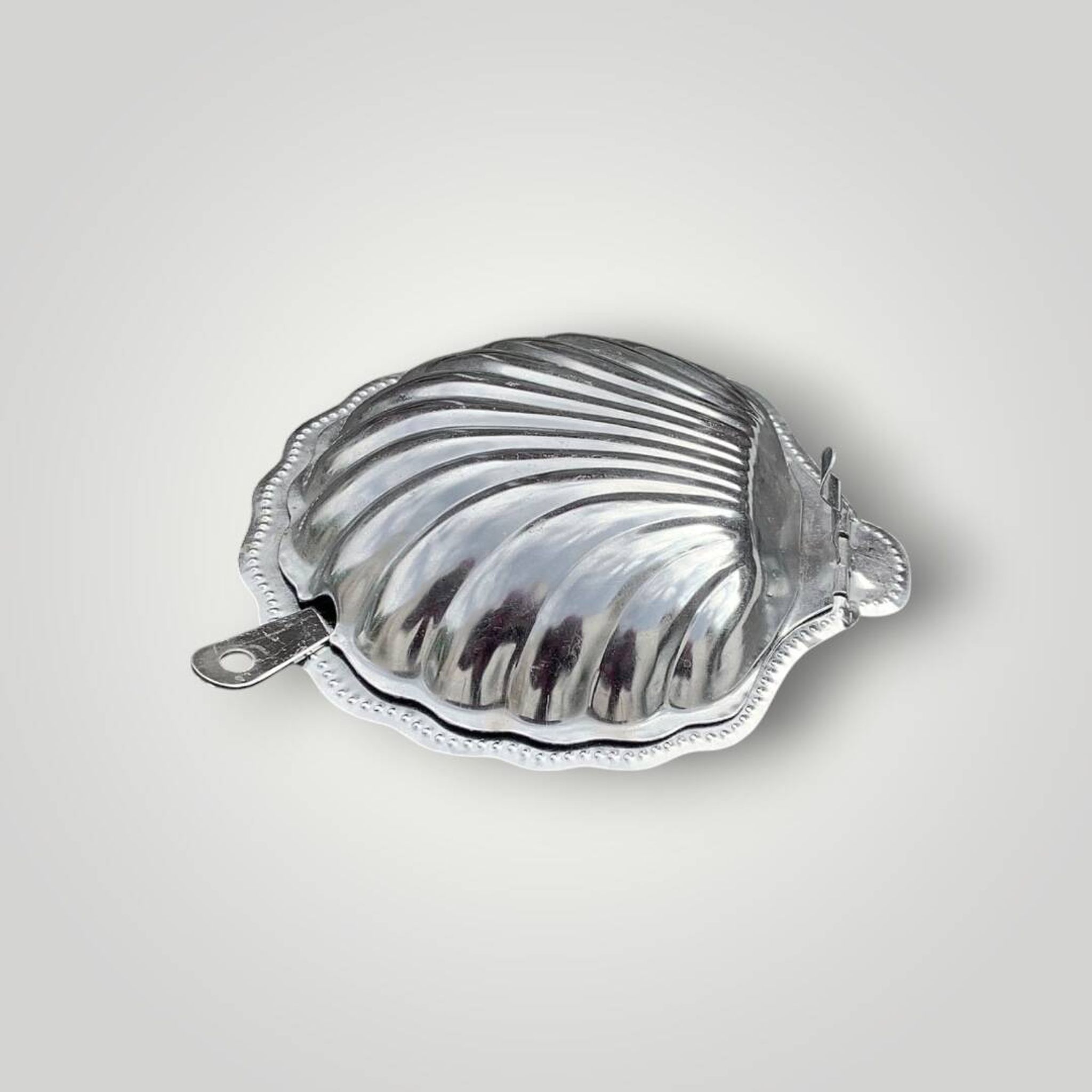 Vintage shell butter dish in stainless steel and cobalt blue glass with knife