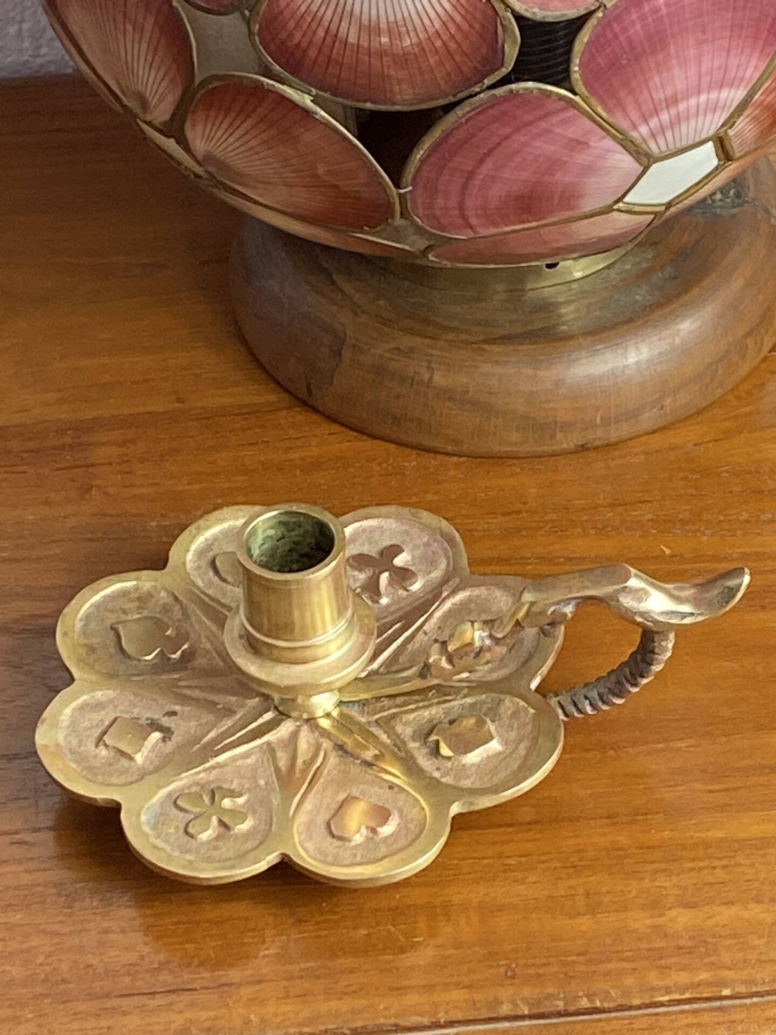 Handheld candlestick in bronze, card game decoration