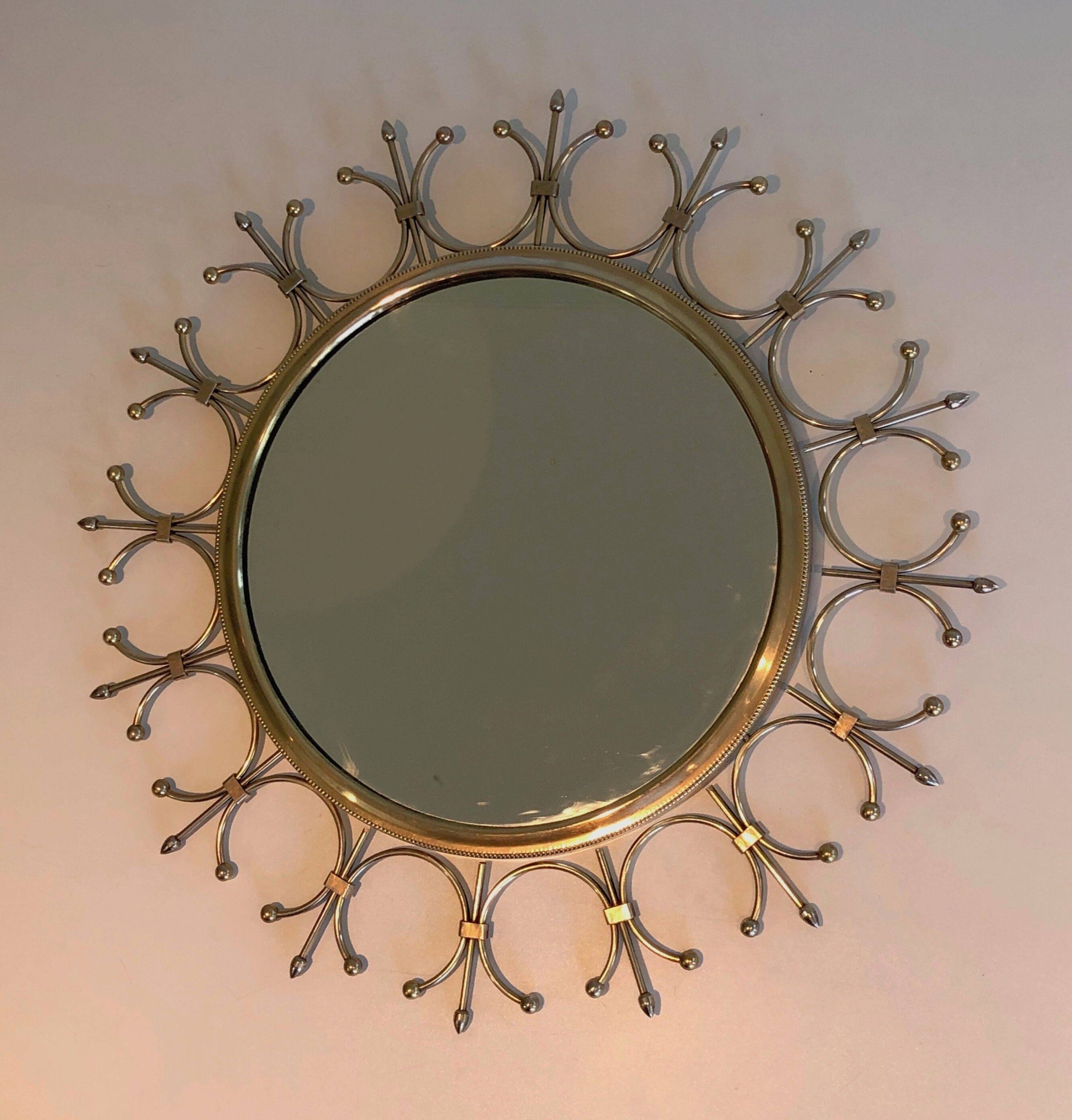 Sun mirror in brass and brushed steel