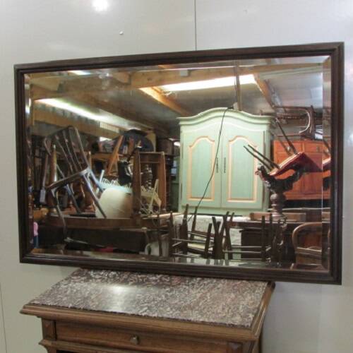 Large beveled mirror, simple wooden frame
