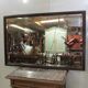 Large beveled mirror, simple wooden frame