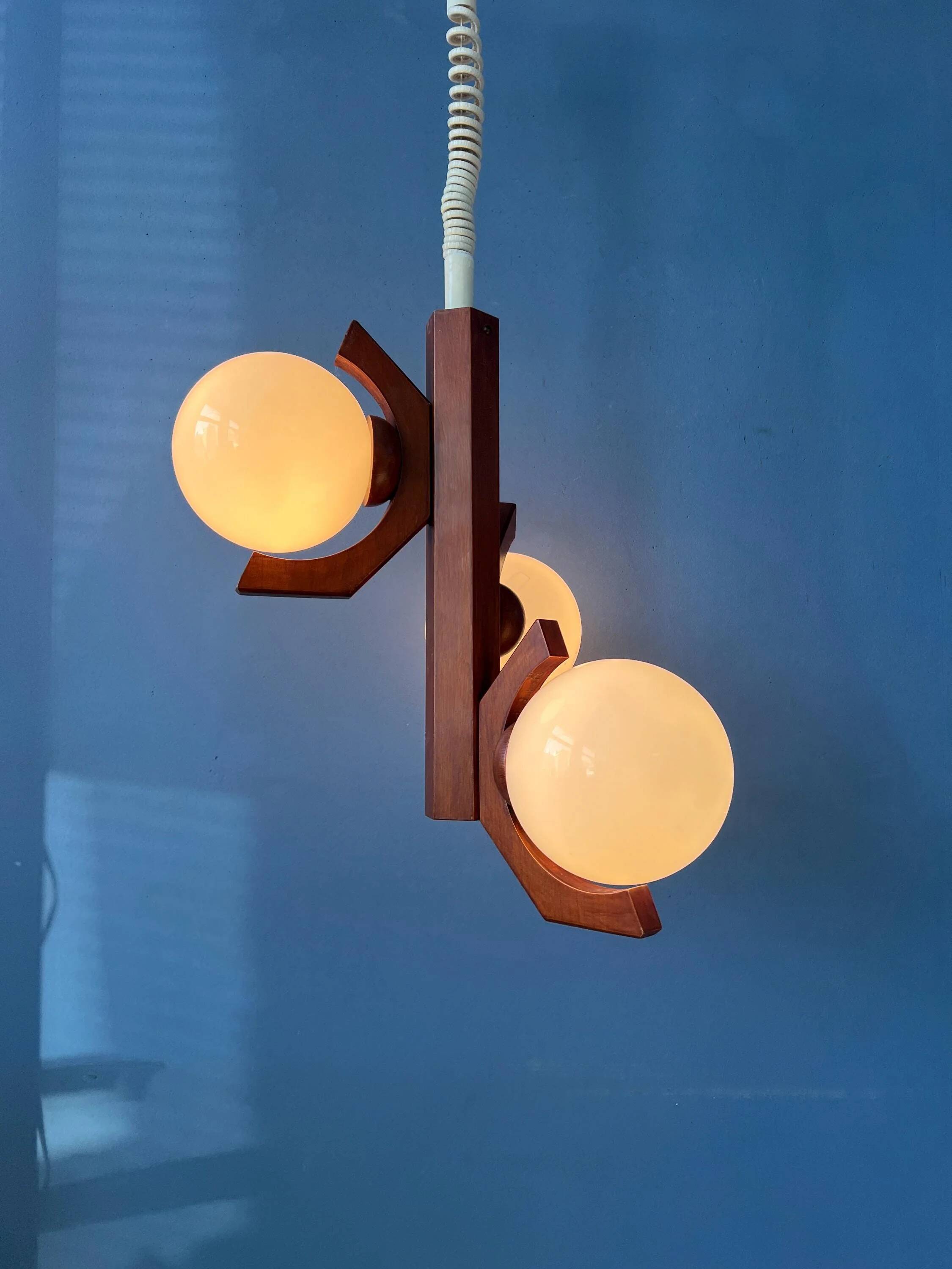 Mid-century brown Bony suspension with opaline glass shade.