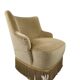 Set of 2 vintage 'gold' armchairs with fringes.
