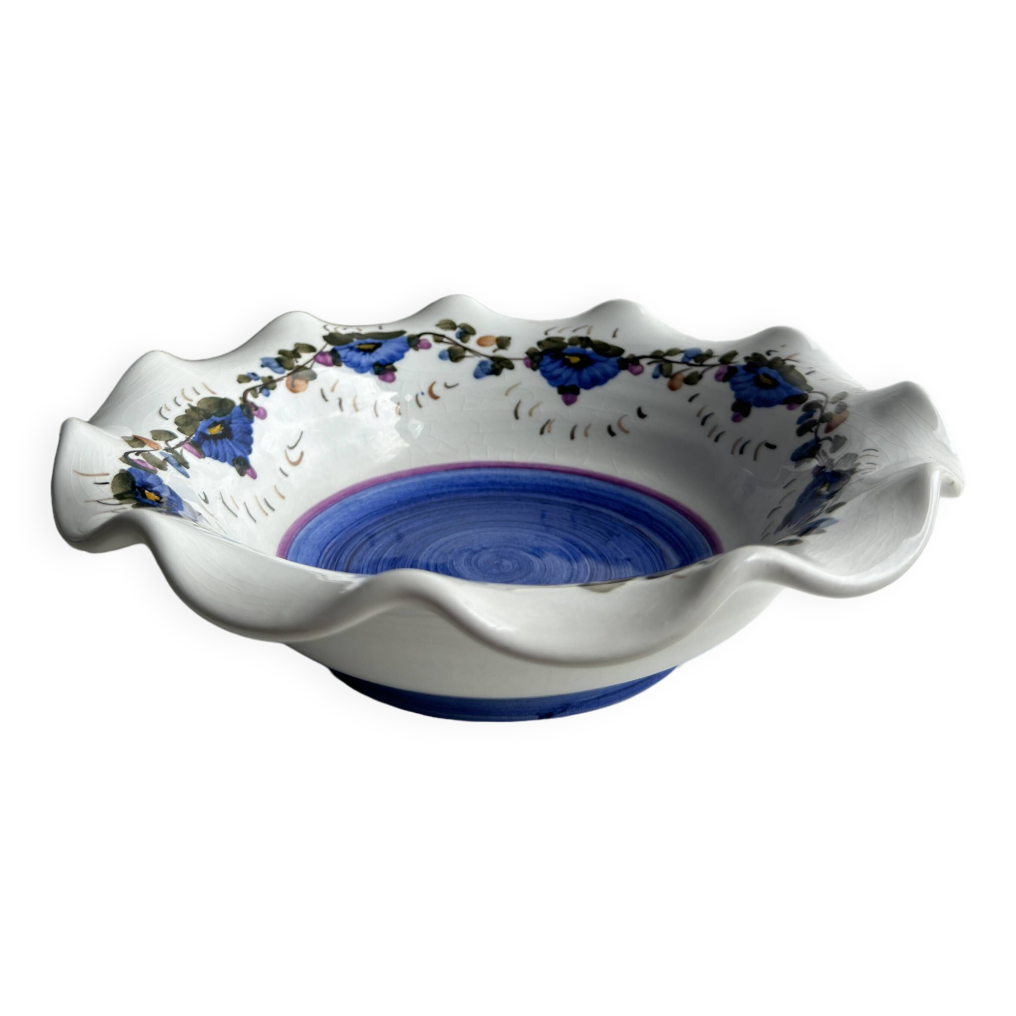 Small hand-painted earthenware salad bowl with garland of blue flowers, mark below