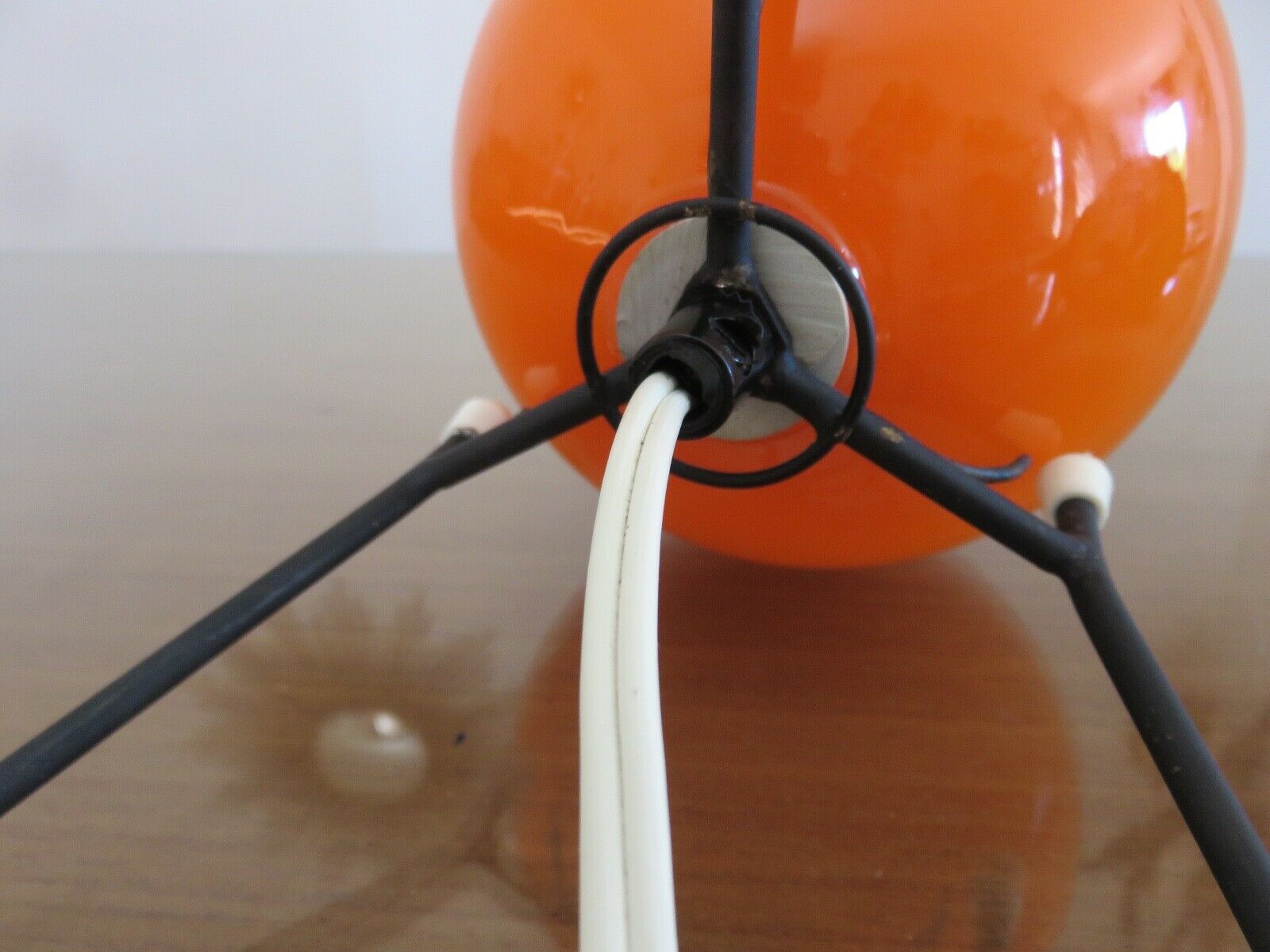 Tripod lamp "Sputnik" in orange opaline and black lacquered metal 60s 70s