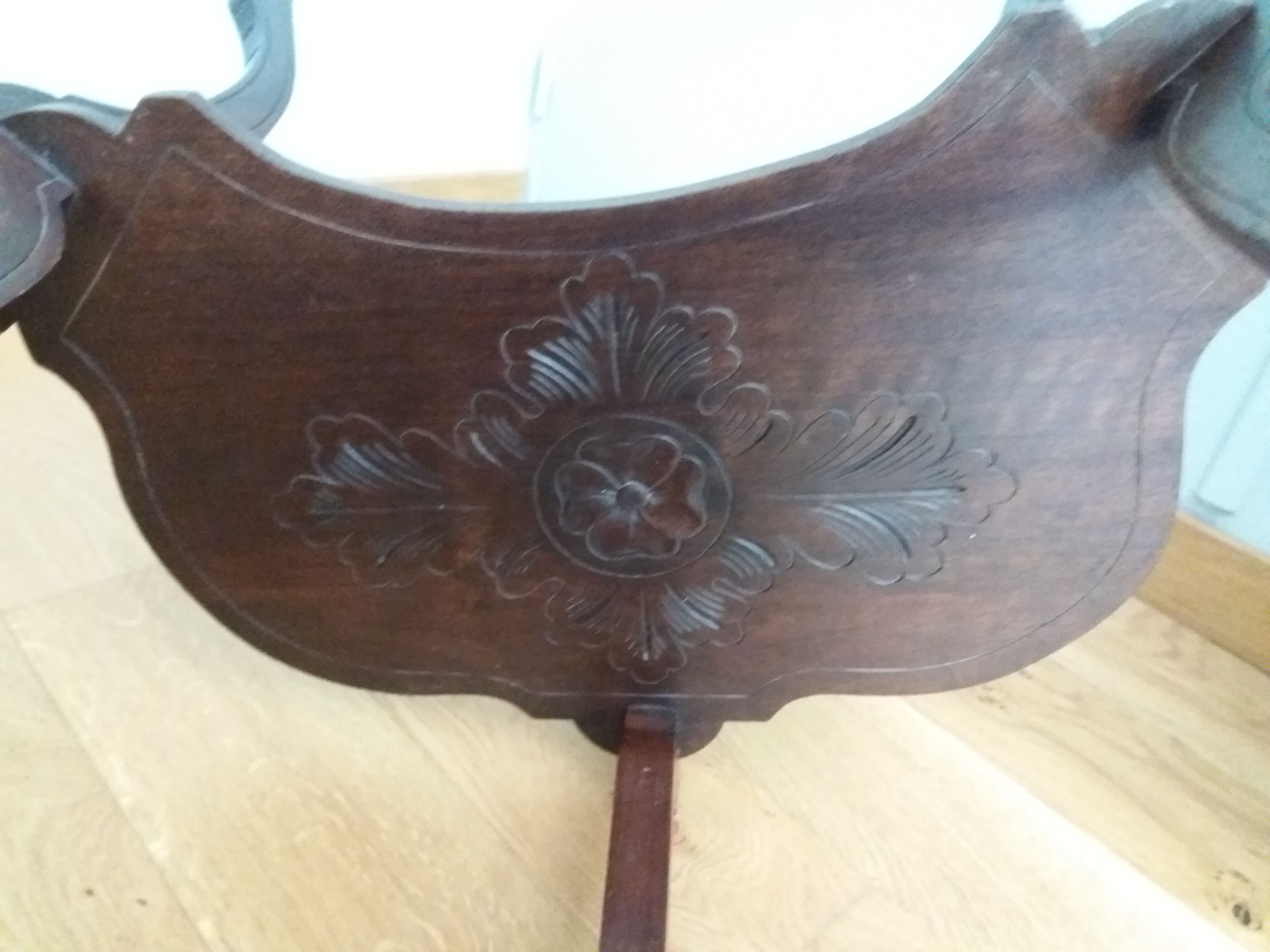 Triplet console harness in carved wood