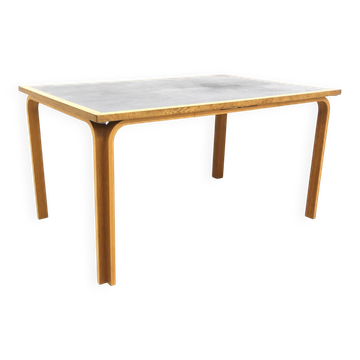 Scandinavian beech dining table, Magnus Olesen, Denmark, 1960.