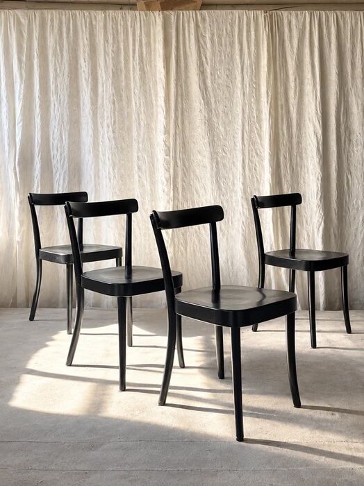 Set of four black Moser 1-250 wooden dining chairs, Werner Max Moser design