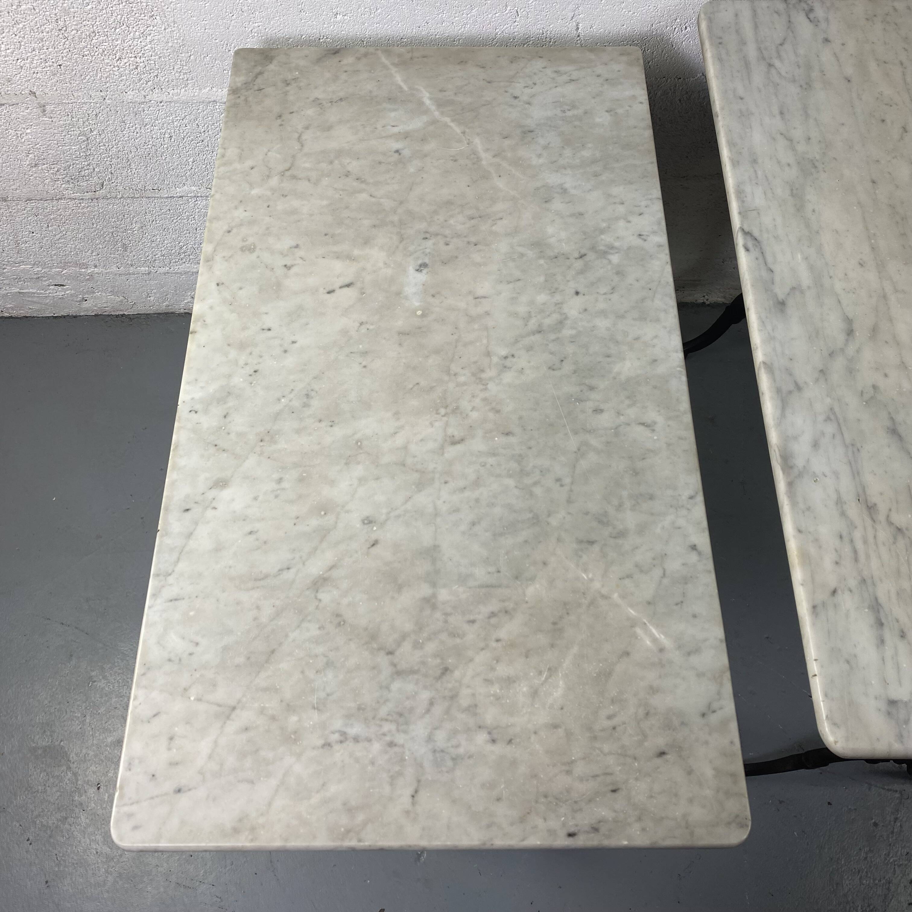 Set of two bistro tables in marble and wrought iron