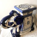 Pair of ceramic elephant side tables