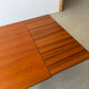 Rectangular extendable table in Scandinavian design made of solid teak.