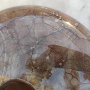 Flattened spherical vase made of glass paste