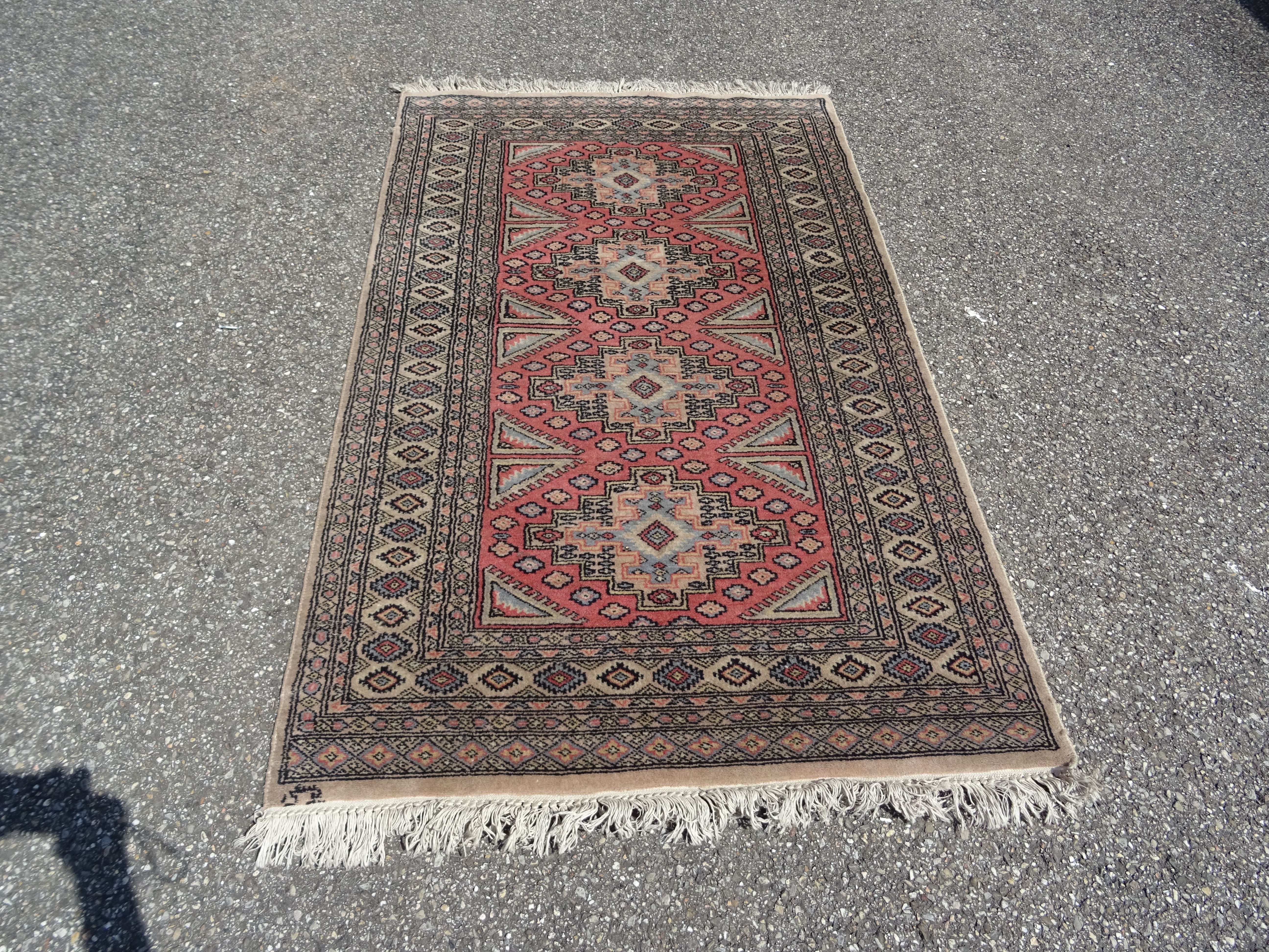 Pakistani carpet Bukhara handmade wool signed