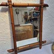 Vintage wooden mirror imitating bamboo