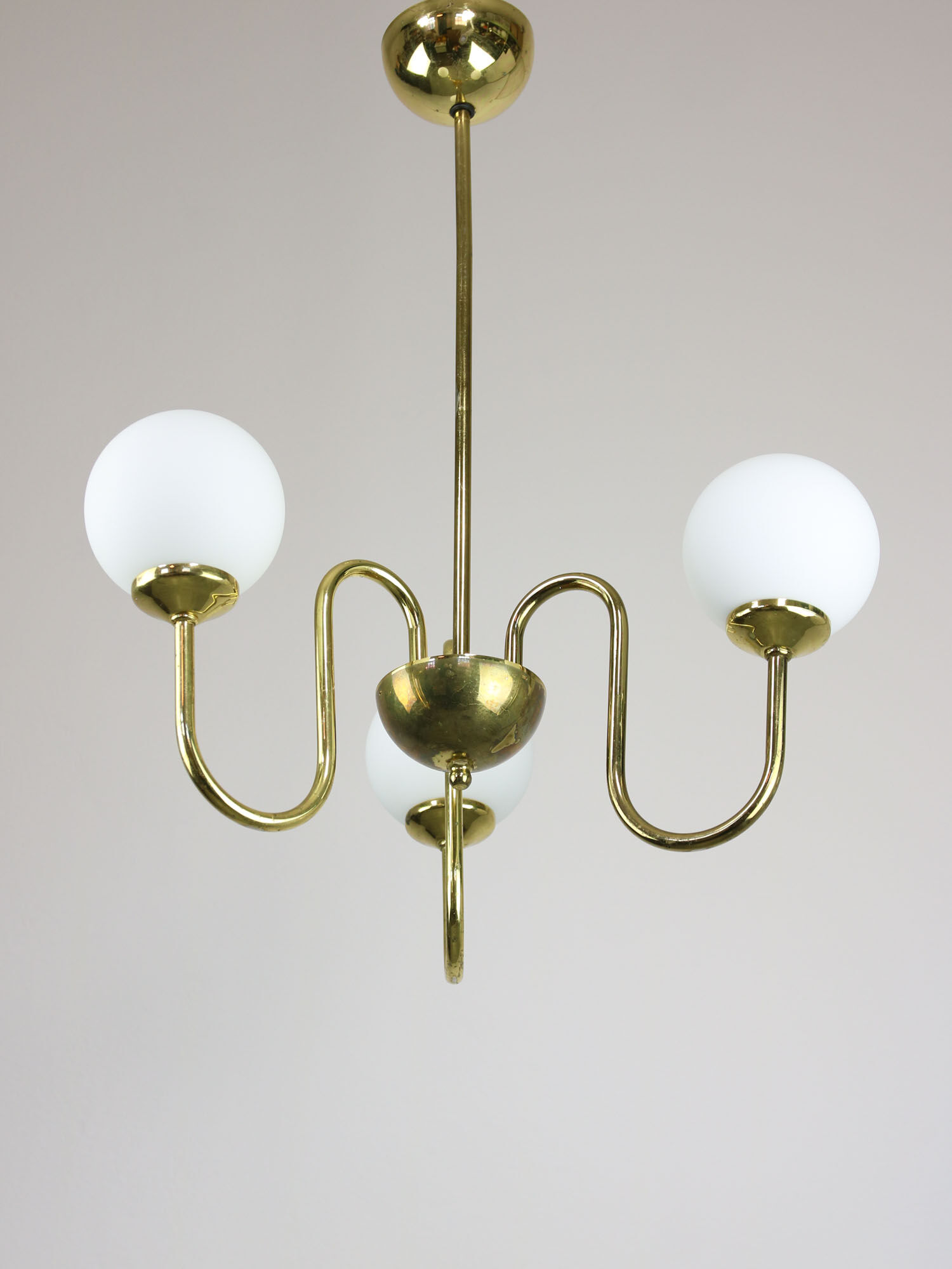 Vintage golden chandelier in opaline glass