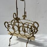 20th century openwork bronze and brass magazine rack