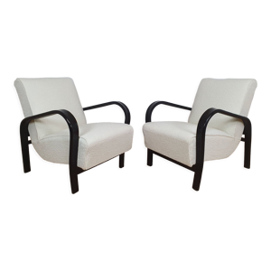 Paire de fauteuils restaurés
