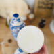 Set of two vintage painted ceramic apothecary pots