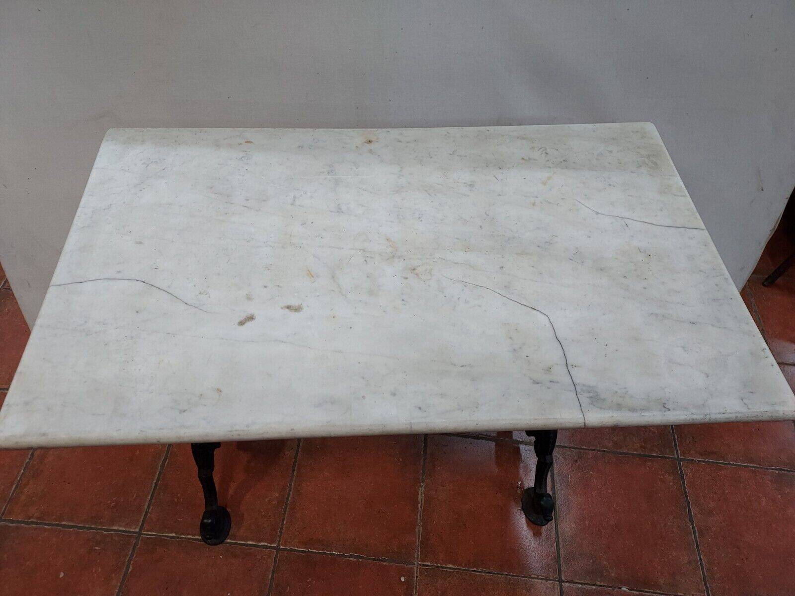 bistro table with cast iron base and marble top
