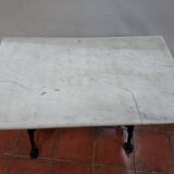 bistro table with cast iron base and marble top