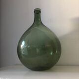 Demijohn old bottle in blown glass