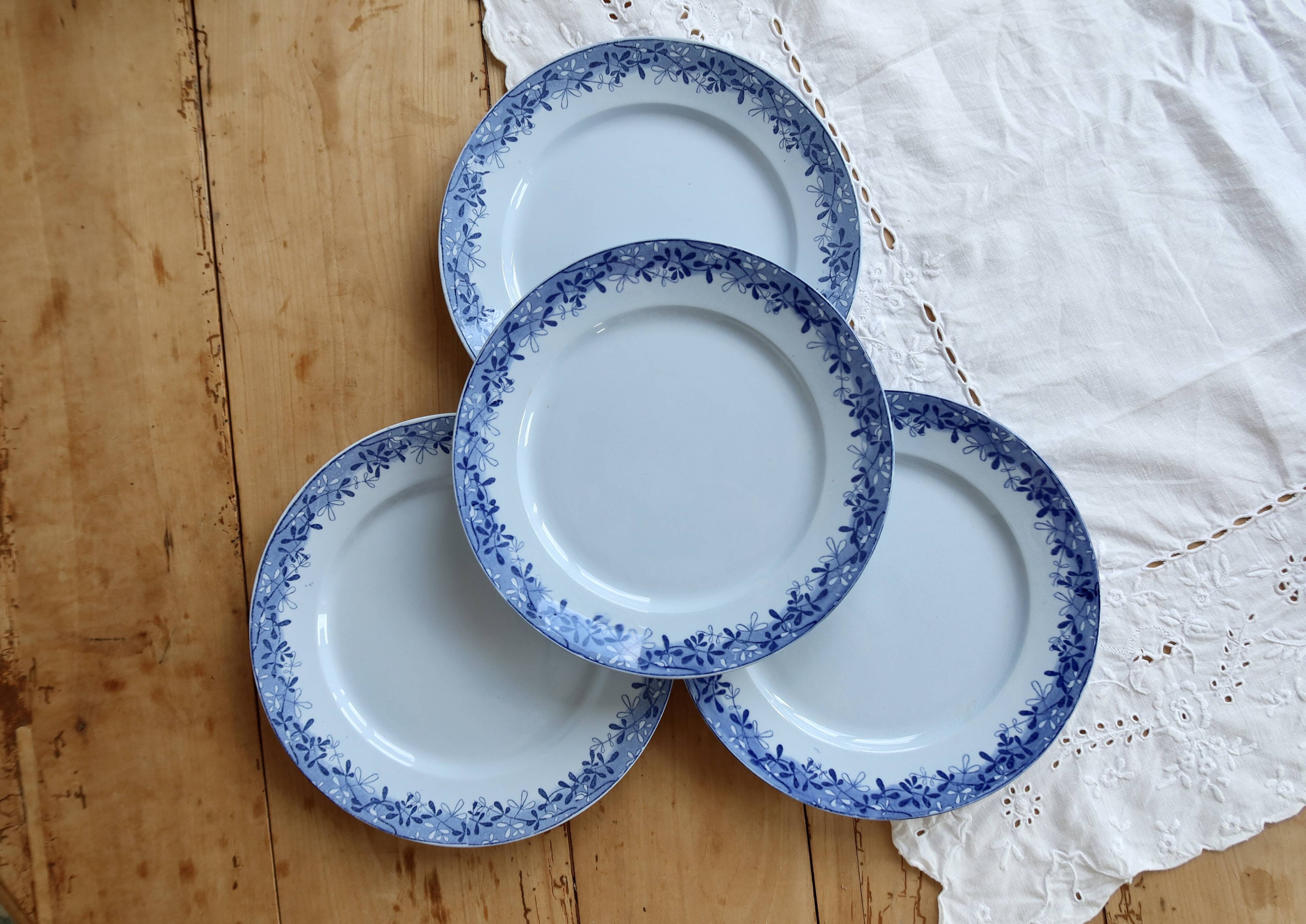 4 antique flat plates from Sarreguemines U&C in the Mimosa blue pattern.