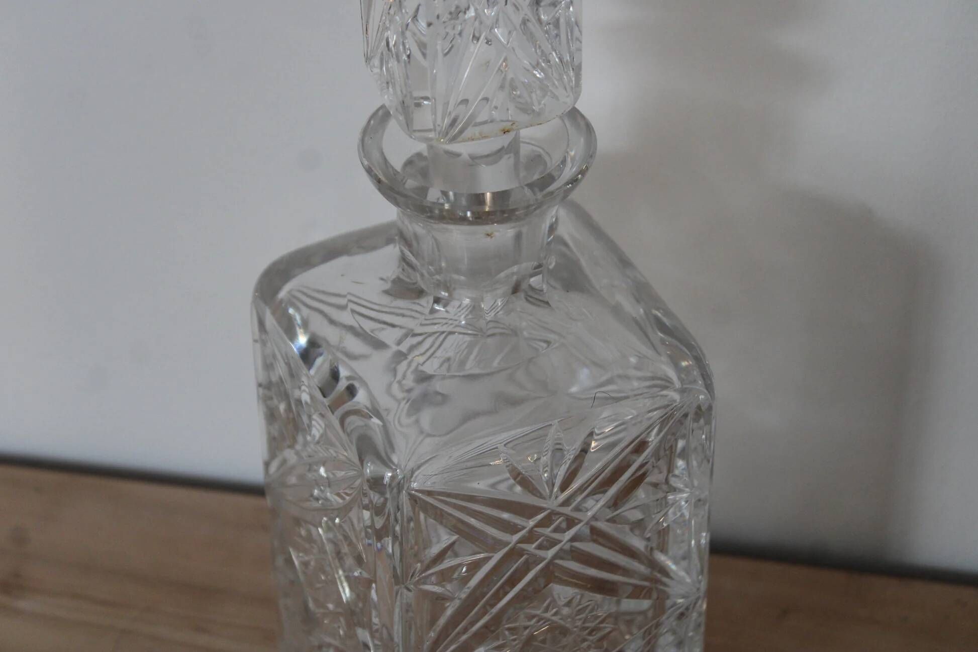 Antique cut glass carafe, probably crystal – Geometric patterns and matching stopper.