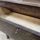 Antique chest of drawers on wheels with wood carving (key top drawer)